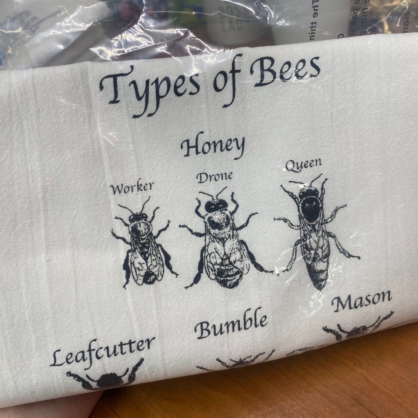 different types of bees on a cotton tea towel