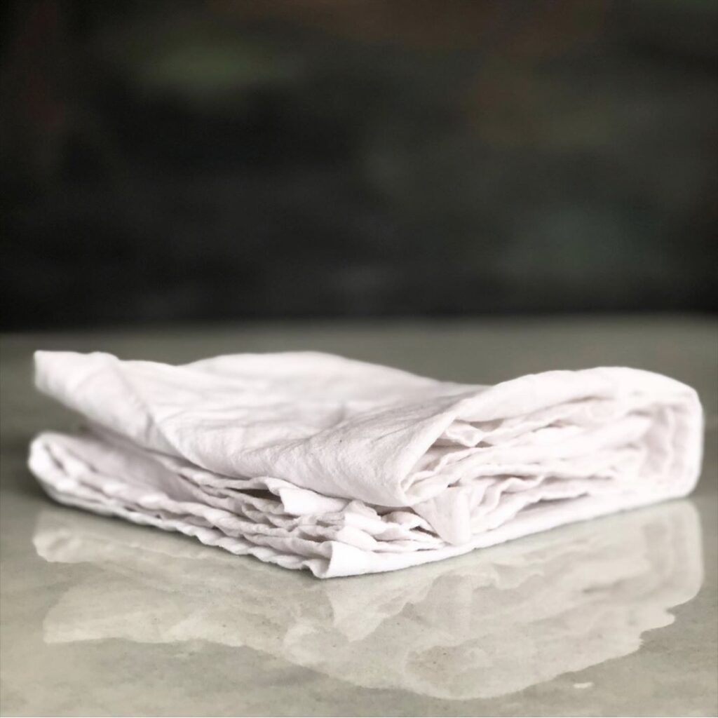 image of a single folded towel on a counter