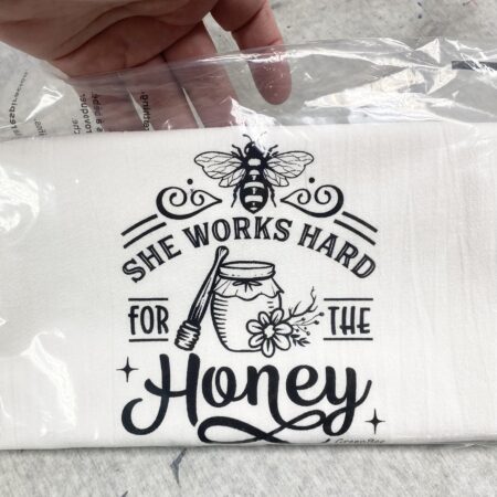 She works hard for the honey kitchen towel
